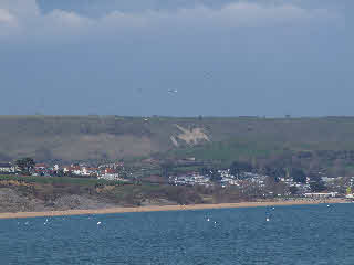 Osmington White Horse picture, carved into the cliffs high above Osmington.