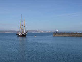 Weymouth harbour welcoming a tall ship